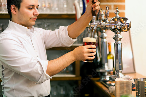Photo: Man drawing a beer Man drawing a beer