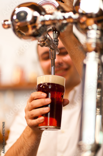 Photo: Man drawing a beer Man drawing a beer