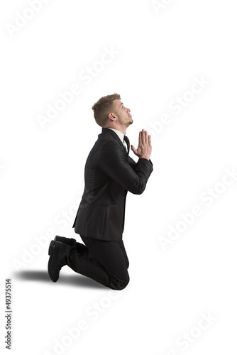 Photo: Businessman praying Businessman praying