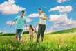 Photo: happy family having fun outdoors happy family having fun outdoors