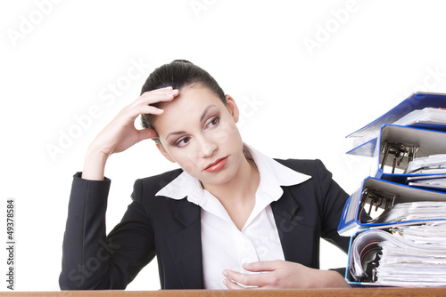 Photo: Tired and exhousted business woman. Tired and exhousted business woman.