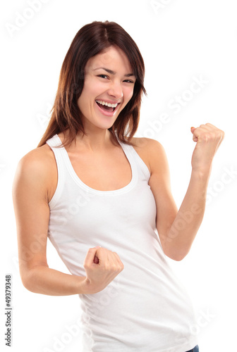 Photo: Winning success woman happy ecstatic celebrating being a winner Winning success woman happy ecstatic celebrating being a winner