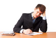 Photo: Cute man writing document Cute man writing document