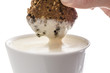 Dipping a cookie in cocoa