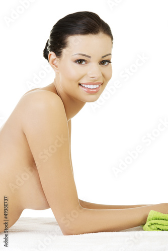 Photo: Beauty young woman relaxing in spa. Beauty young woman relaxing in spa.