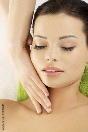 Photo: Face massage therapy at spa saloon Face massage therapy at spa saloon