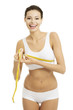 Pretty smiling woman measuring breast