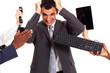 Photo: frustrated businessman around by multiple office tools frustrated businessman around by multiple office tools