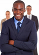 handsome african american businessman in front of team