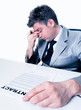 tired businessman at the office