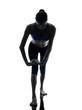 woman exercising yoga warrior position