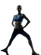 woman exercising yoga warrior position
