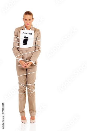 Photo: young woman tied with cell phone contract young woman tied with cell phone contract