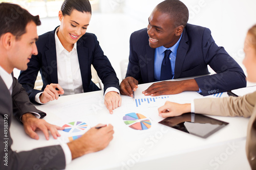Photo: group of business people having meeting together group of business people having meeting together