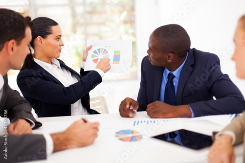 Photo: group of business people having meeting together group of business people having meeting together