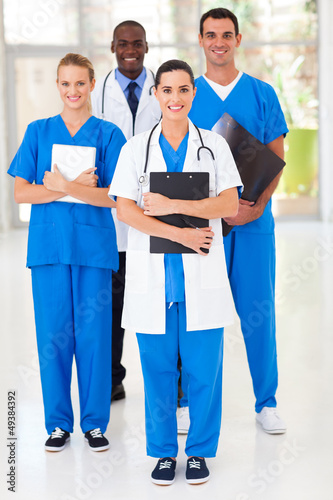Photo: group of medical workers full length portrait in hospital group of medical workers full length portrait in hospital