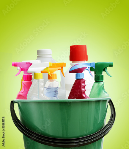 Photo: Cleaning bottles in bucket Cleaning bottles in bucket