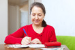  woman is calculated the family budget