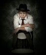 Photo: Portrait looking danger detective man Portrait looking danger detective man