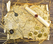 Pirate map with coins and scroll
