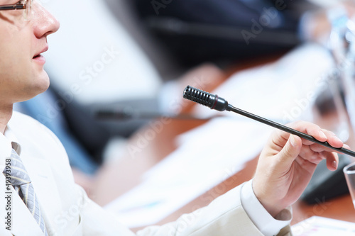 Photo: Businessman at meeting Businessman at meeting