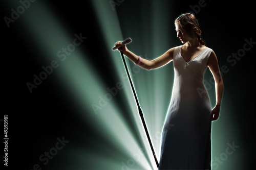 Photo: Female singer on the stage Female singer on the stage