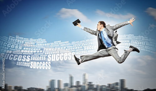 Photo: Image of running businessman Image of running businessman