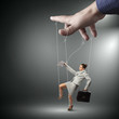 Business woman marionette