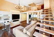 Modern minimalism style two-high drawing-room interior with stai