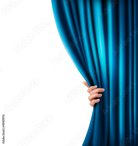Background with blue velvet curtain and hand.