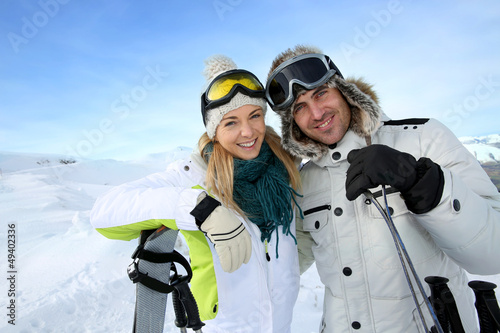 Photo: Cheerful couple enjoying winter vacation Cheerful couple enjoying winter vacation