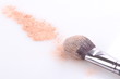 makeup brush and powder isolated