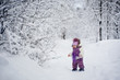 Photo: Baby girl's first steps in snowy forest Baby girl's first steps in snowy forest