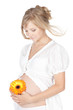 Pregnant woman holding her belly