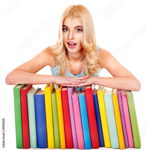 Photo: Student with stack book. Student with stack book.