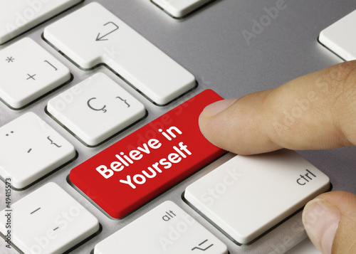 Photo: Believe in Yourself keyboard key. Finger Believe in Yourself keyboard key. Finger