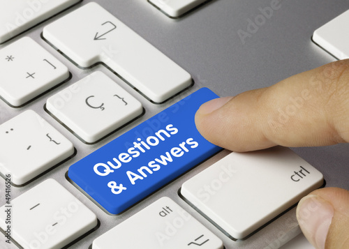 Photo: Questions & Answers keyboard key. Finger Questions & Answers keyboard key. Finger