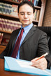 Man writing on a document