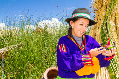 Photo: Woman, in indian costume on Uros island Peru Woman, in indian costume on Uros island Peru