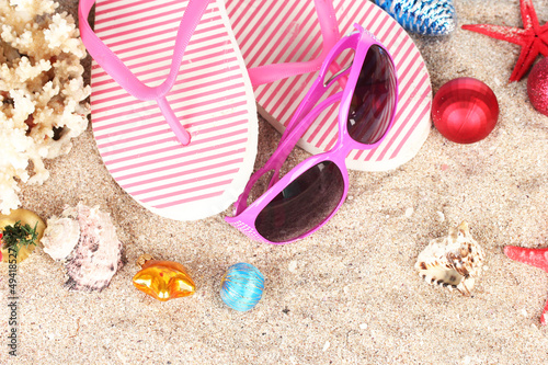 Photo: Christmas balls,seashells andh beach accessories Christmas balls,seashells andh beach accessories