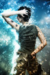 Foto: Young female hero fighting and holding a gun Young female hero fighting and holding a gun