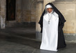Nun kneeling