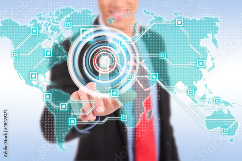 Photo: business man pushing virtual buttons business man pushing virtual buttons