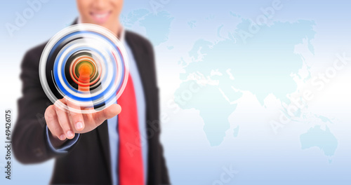 Photo: Businessman pressing circle button Businessman pressing circle button