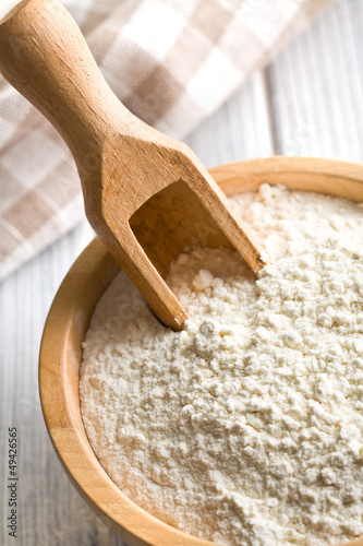 Photo: flour in wooden bowl flour in wooden bowl