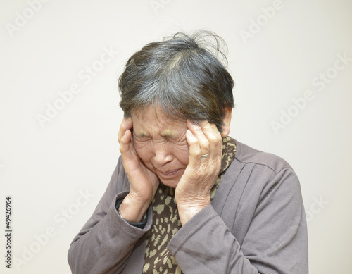 Photo: 頭が痛い女性 頭が痛い女性