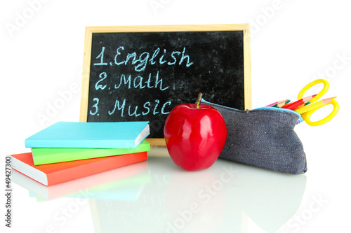 Photo: pencil box with school equipment and timetable isolated on pencil box with school equipment and timetable isolated on