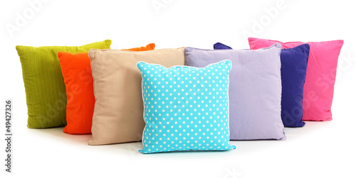 Photo: Colorful pillows isolated on white Colorful pillows isolated on white