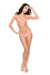 Young woman with lingerie in front of white background