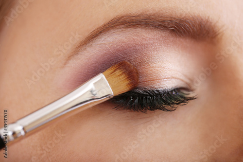 Photo: Beautiful female eye with bright make-up, close up Beautiful female eye with bright make-up, close up